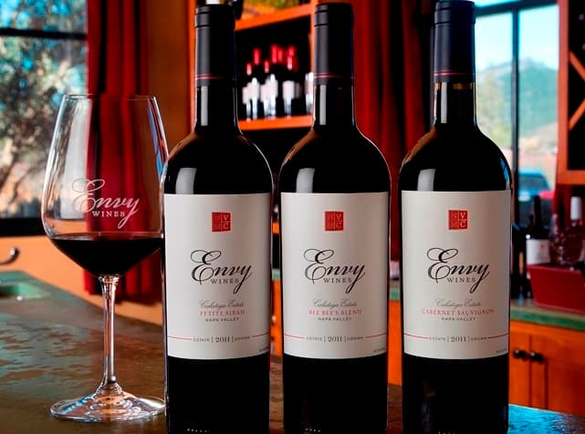 Envy bottles and a branded glass in the tasting room